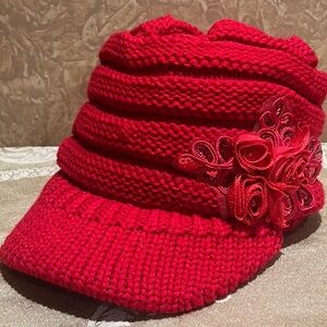 Stylish Red Knit Hat with Floral Accent